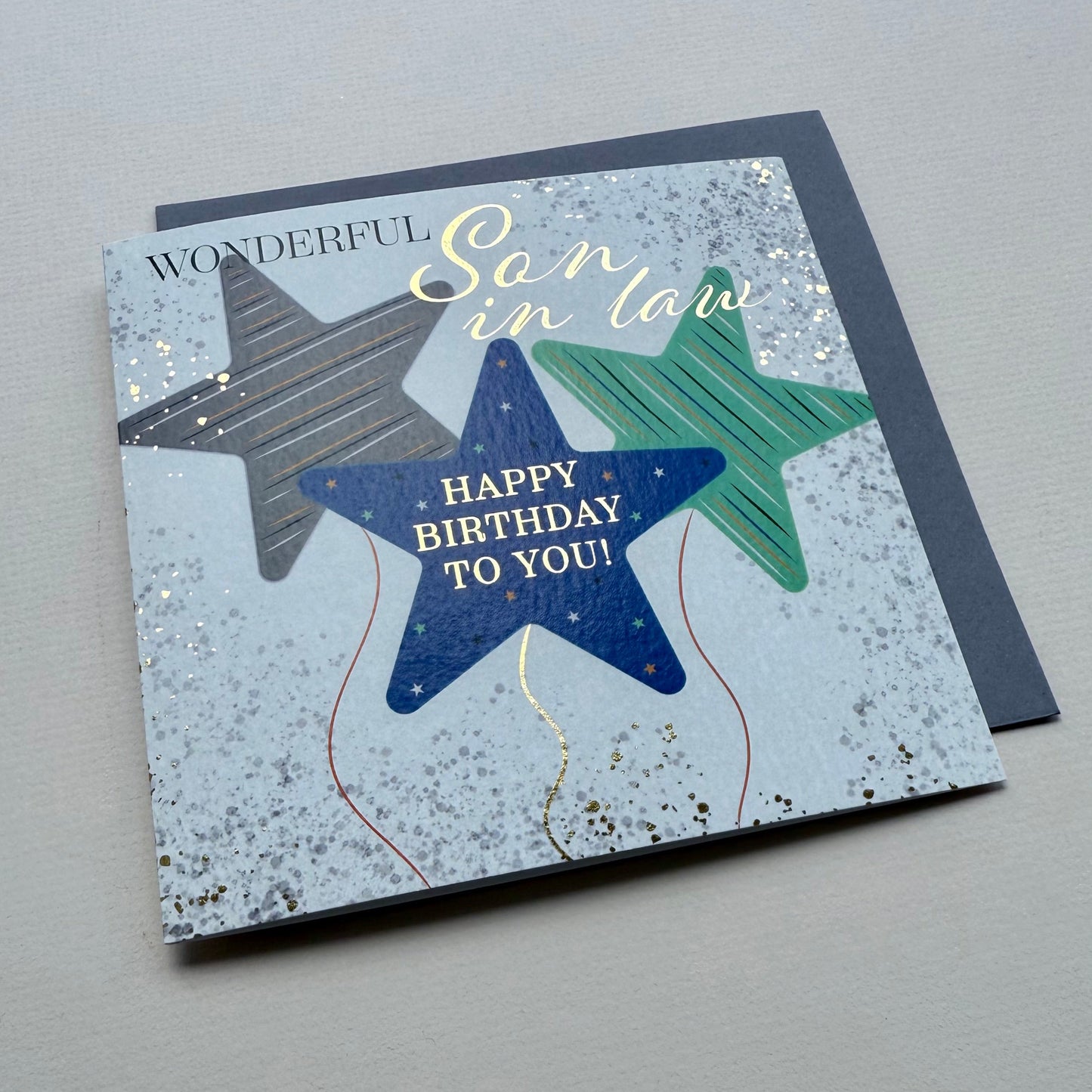 Birthday card for son-in-law with colorful stars on a gray background