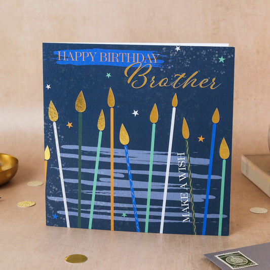 Birthday card for brother with candles design on a wooden surface