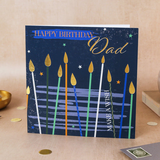 Birthday card for Dad with candles design on a wooden surface