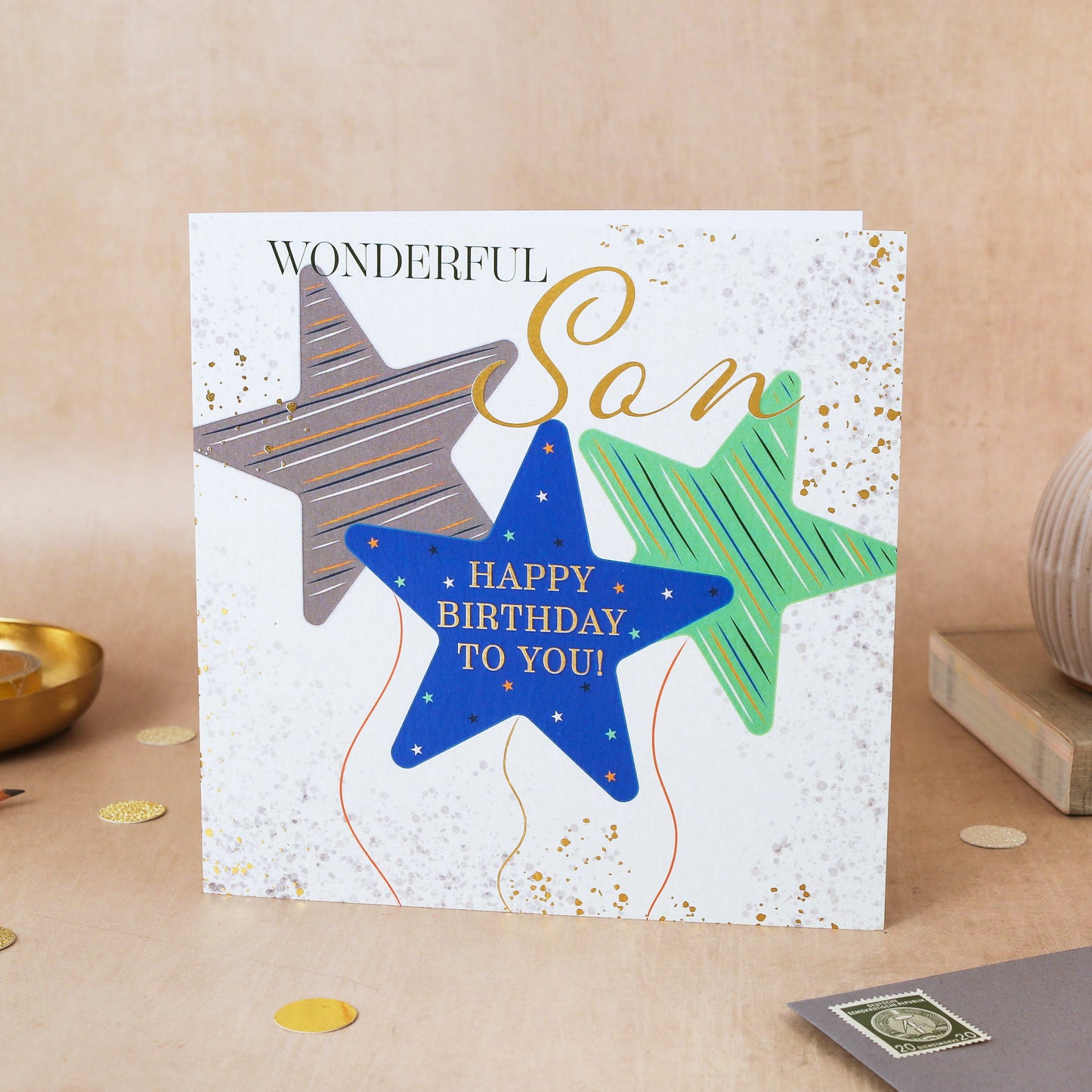 Birthday card with stars for a wonderful son on a wooden surface.