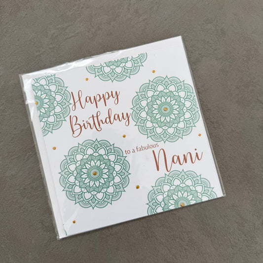 Greeting card with mandala designs and 'Happy Birthday to a fabulous Nani' text on a gray background