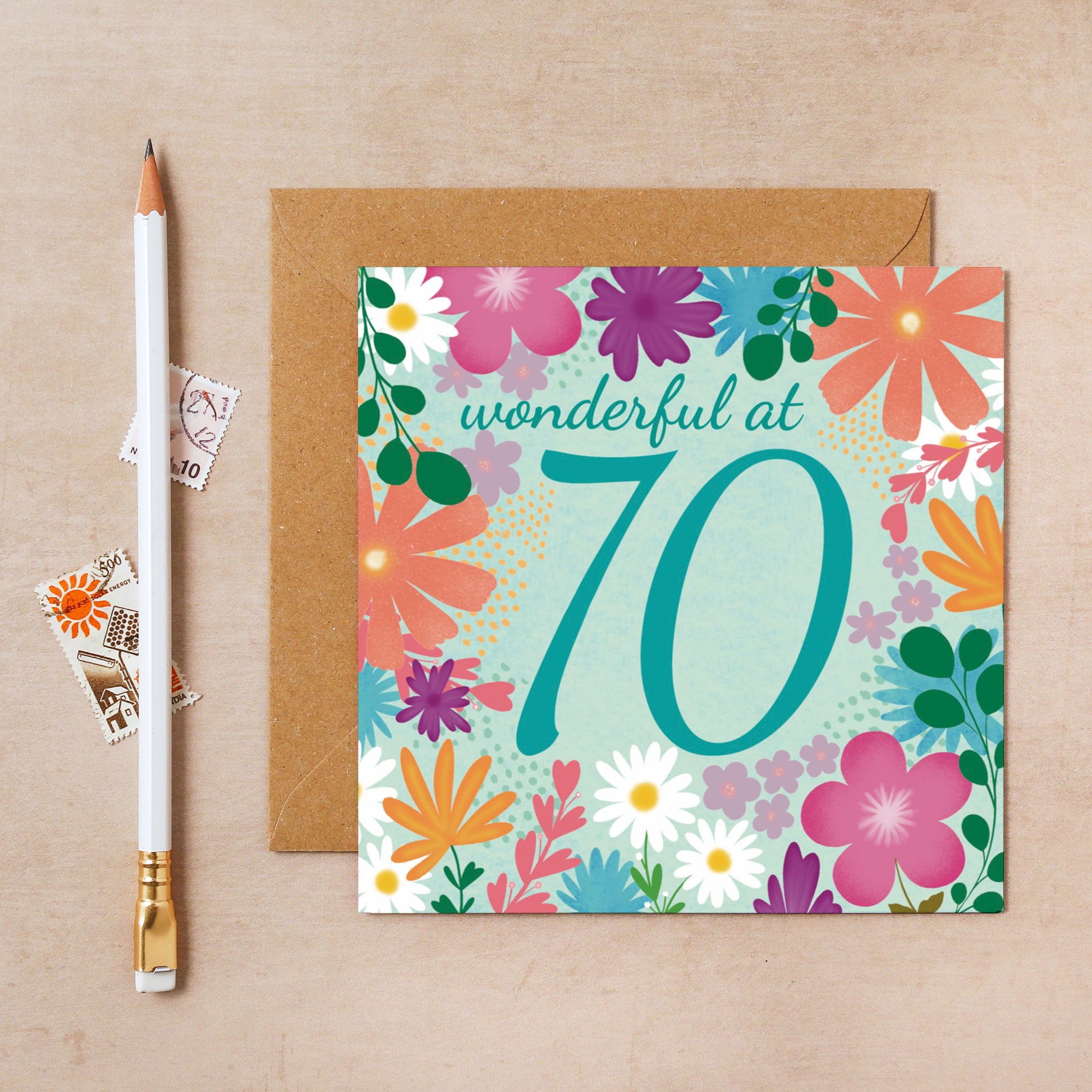 Floral birthday card with 'wonderful at 70' text on a beige background