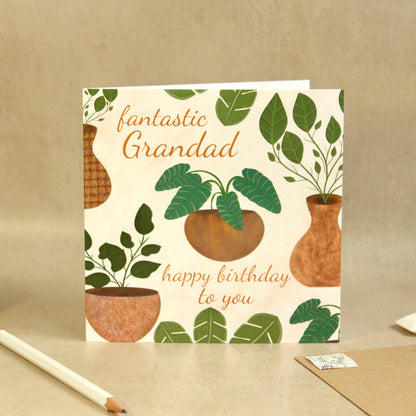 Greeting card for a fantastic grandad with plant designs on a beige background