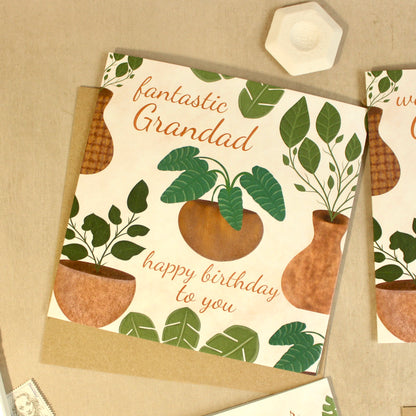 Greeting card with plant designs and text for a grandad's birthday on a beige background.