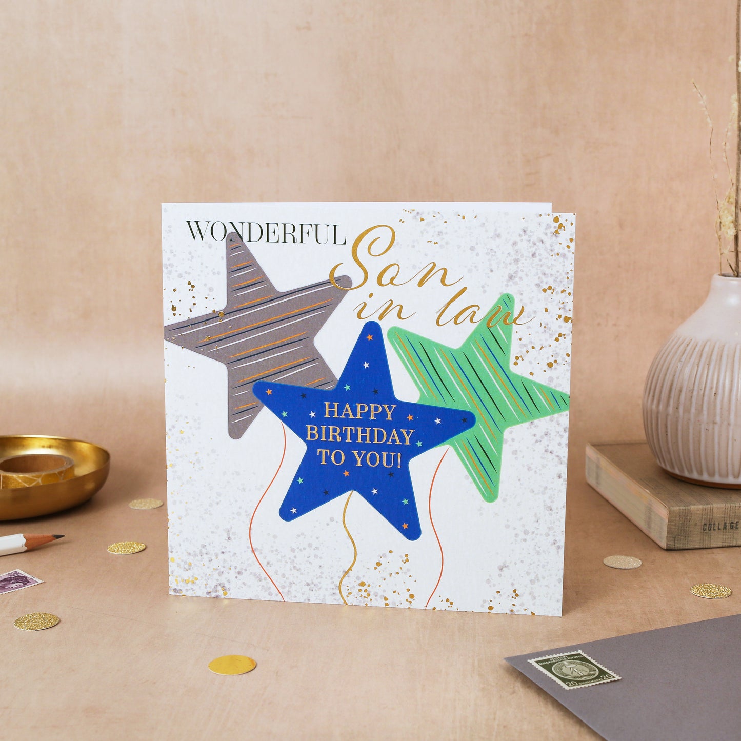 Birthday card for a son-in-law with colorful stars on a beige surface