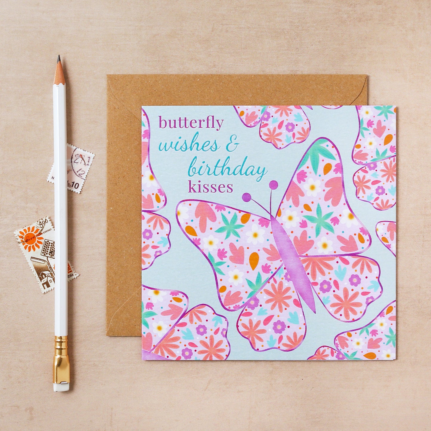 Greeting card with butterfly design and text on a beige background