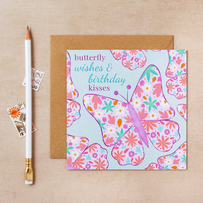 Greeting card with butterfly design and text on a beige background